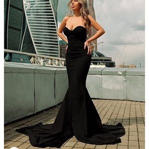 Black sleeveless slit front formal gown with train